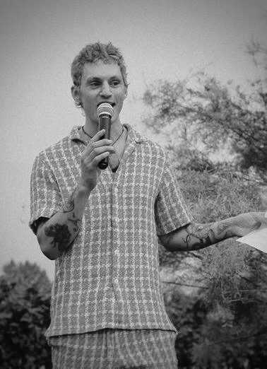 Aaron speaking at a wedding ceremony